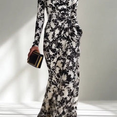 Black and white color-blocked printed long-sleeve maxi dress with pockets, slim fit, pleated design by Christine Brewer.