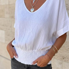 Christine Brewer Ella V-Neck Top for Women, stylish cotton T-shirt in a versatile V-neck design, shown in natural fabric detail.