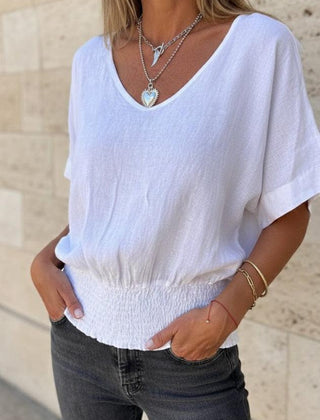 Christine Brewer Ella V-Neck Top for Women, stylish cotton T-shirt in a versatile V-neck design, shown in natural fabric detail.