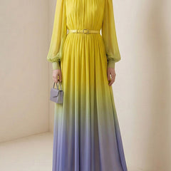 Christine Brewer high waisted maxi dress with long sleeves, belt, contrast color gradient, pleats, split joint, and round neck design.