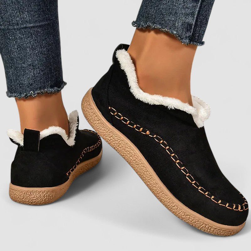 Dorry orthopedic women's boots by Christine Brewer, featuring supportive design and comfortable fit, shown in black leather.