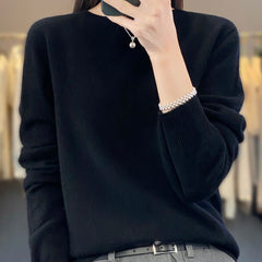 Delilah cozy fluffy sweater by Christine Brewer featuring a relaxed fit and elegant, soft knit texture for comfortable style.