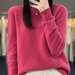Delilah cozy fluffy sweater by Christine Brewer featuring a relaxed fit and elegant, soft knit texture in a neutral color.
