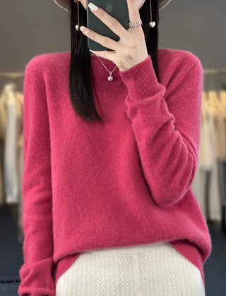 Delilah cozy fluffy sweater by Christine Brewer featuring a relaxed fit and elegant, soft knit texture in a neutral color.