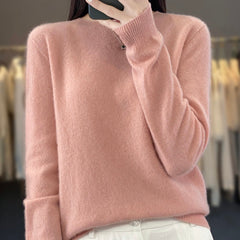 Delilah cozy elegant fluffy sweater by Christine Brewer, relaxed fit with soft, plush texture, styled for casual comfort.