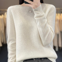 Cream-colored cozy relaxed fit fluffy sweater from Christine Brewer's Delilah collection, featuring a soft, textured knit design.