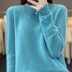 Light beige knit sweater for women from Christine Brewer’s Helena collection, featuring a cozy, stylish design and ribbed cuffs.