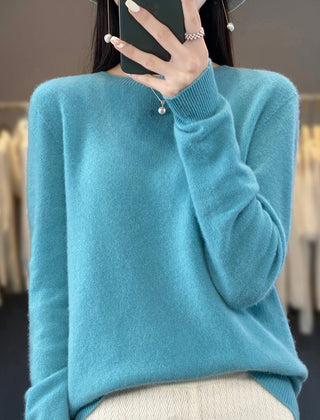 Light beige knit sweater for women from Christine Brewer’s Helena collection, featuring a cozy, stylish design and ribbed cuffs.