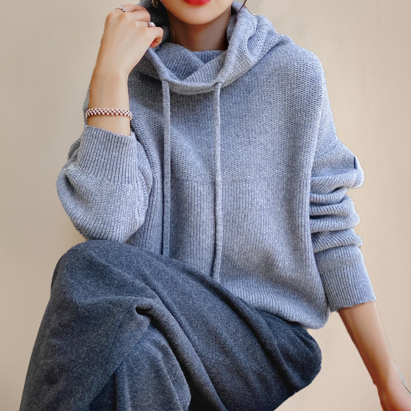Pink hooded sweater for women by Christine Brewer, featuring a cozy hood and casual fit, ideal for comfortable everyday wear.