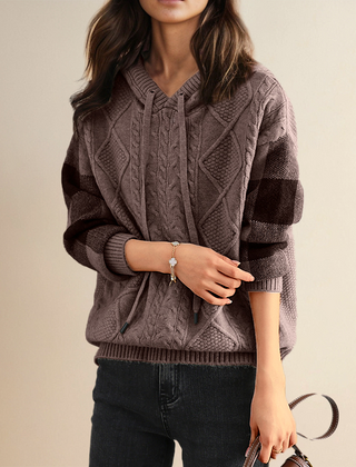 Close-up of the Christine Brewer Thea cable knit hoodie for women from the #1752 Collection, showcasing cozy knit texture.