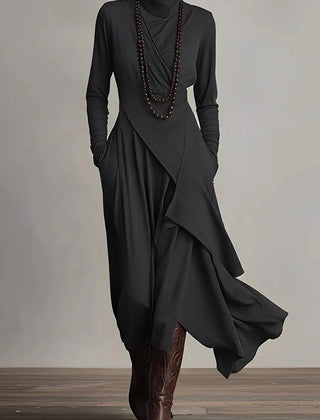 Solid color high-neck long-sleeved casual maxi dress by Christine Brewer, featuring an irregular hem and relaxed fit.