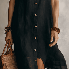 Black linen relaxed midi dress for women by Christine Brewer, featuring a flowing silhouette and casual elegant style.