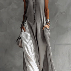 Color-blocked round neck sleeveless maxi dress by Christine Brewer featuring casual style, pockets, and a loose fit.