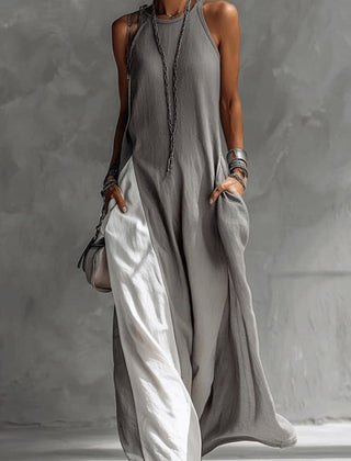 Color-blocked round neck sleeveless maxi dress by Christine Brewer featuring casual style, pockets, and a loose fit.