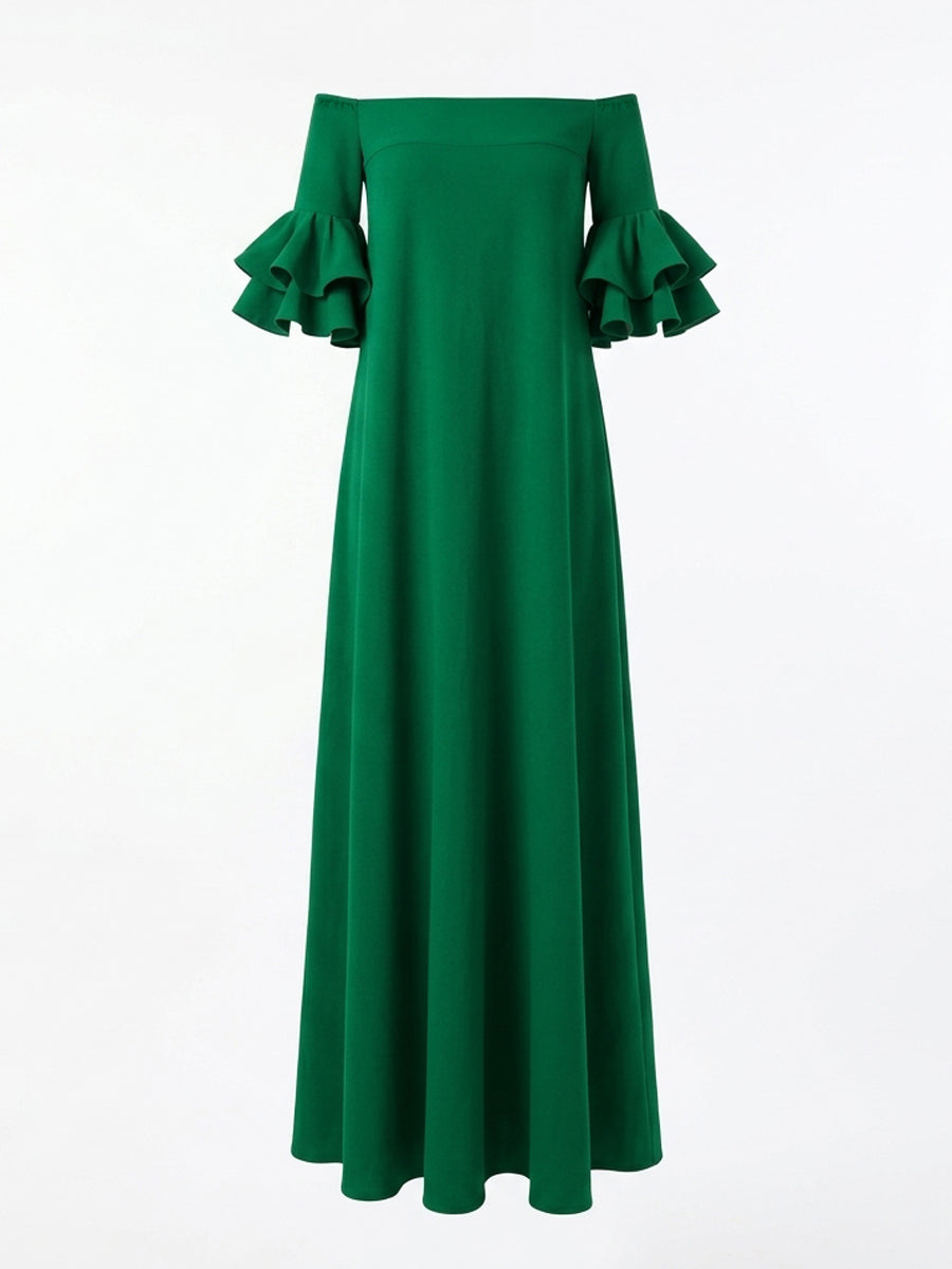 White Christine Brewer maxi dress with half sleeves, loose fit, solid color, off-the-shoulder style, flowing design.