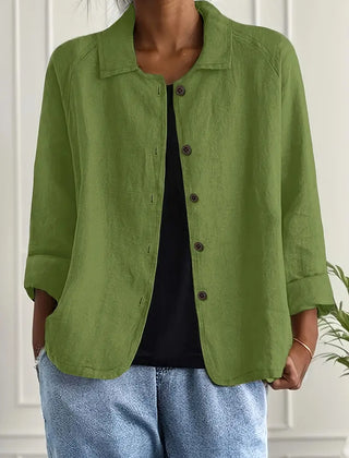 Women’s light gray Ella casual button-front jacket by Christine Brewer, shown hanging with front view and button details.