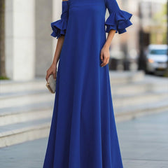 White off-the-shoulder maxi dress with half sleeves and loose fit from Christine Brewer, showcasing its elegant solid color design.