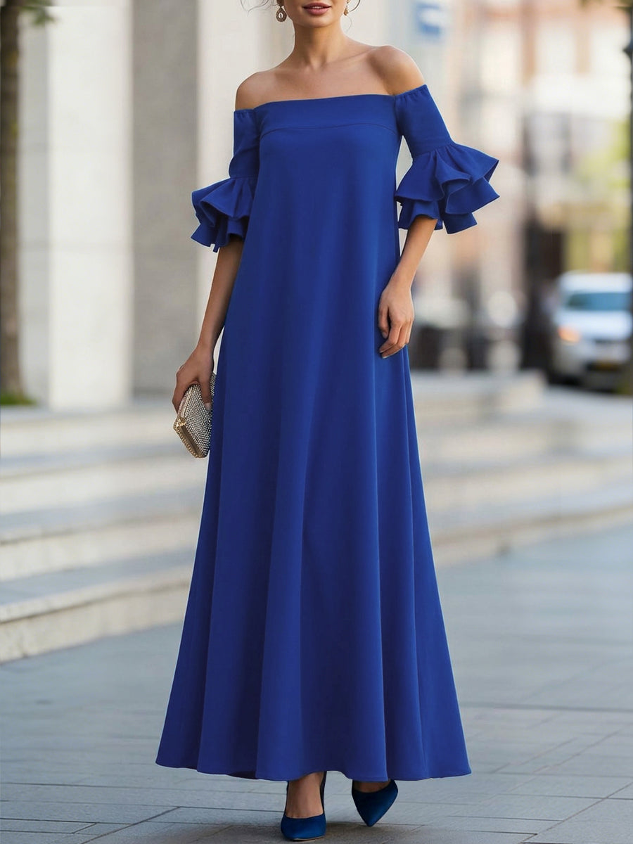 White off-the-shoulder maxi dress with half sleeves and loose fit from Christine Brewer, showcasing its elegant solid color design.
