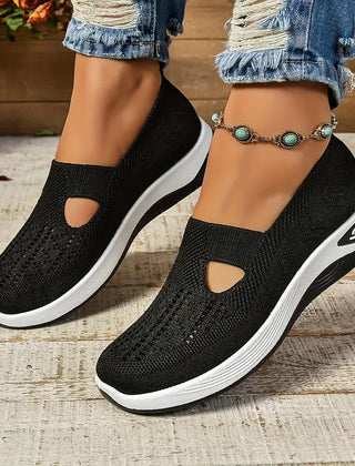 Orthopedic non-slip shoes by Christine Brewer for women with free insoles, designed for comfort and support during walking.