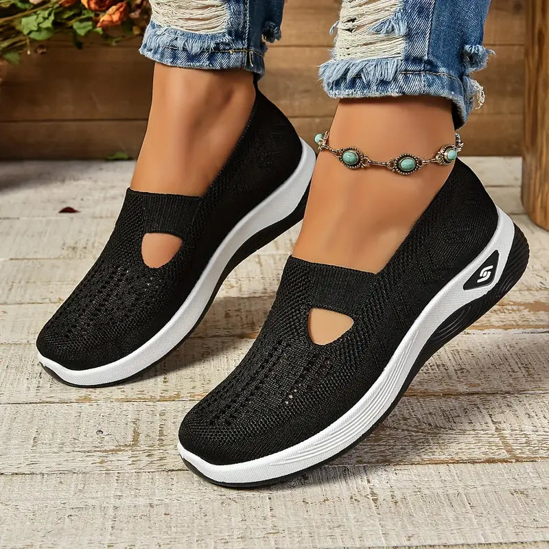 Orthopedic non-slip shoes by Christine Brewer for women with free insoles, designed for comfort and support during walking.