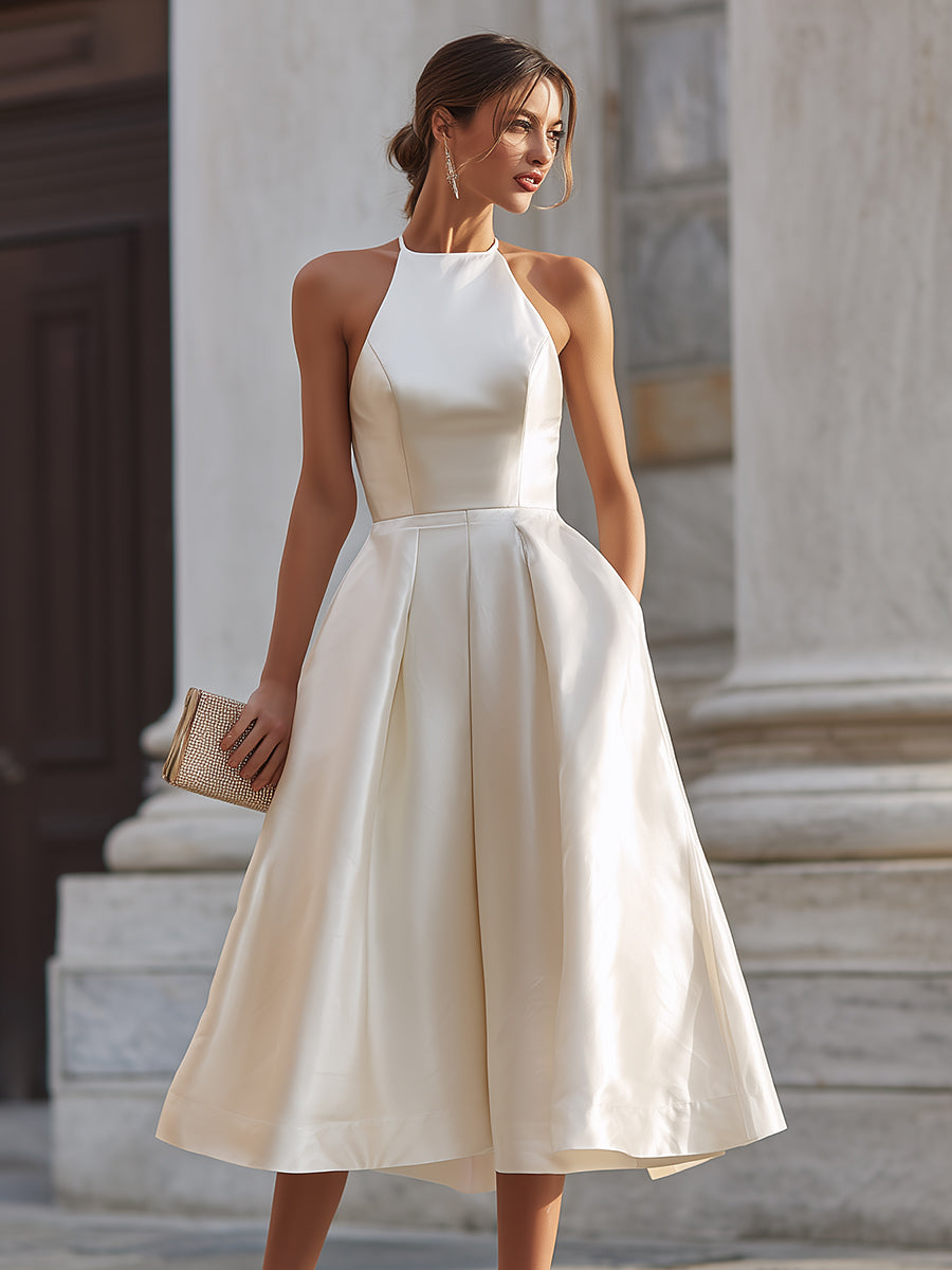 Christine Brewer halter-neck pleated midi dress for women, flowing fabric with a stylish midi-length design and elegant pleats.