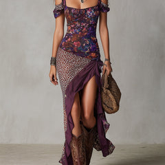 Leopard-print maxi dress for women by Christine Brewer, flowing fabric with bold animal pattern and sleeveless design.