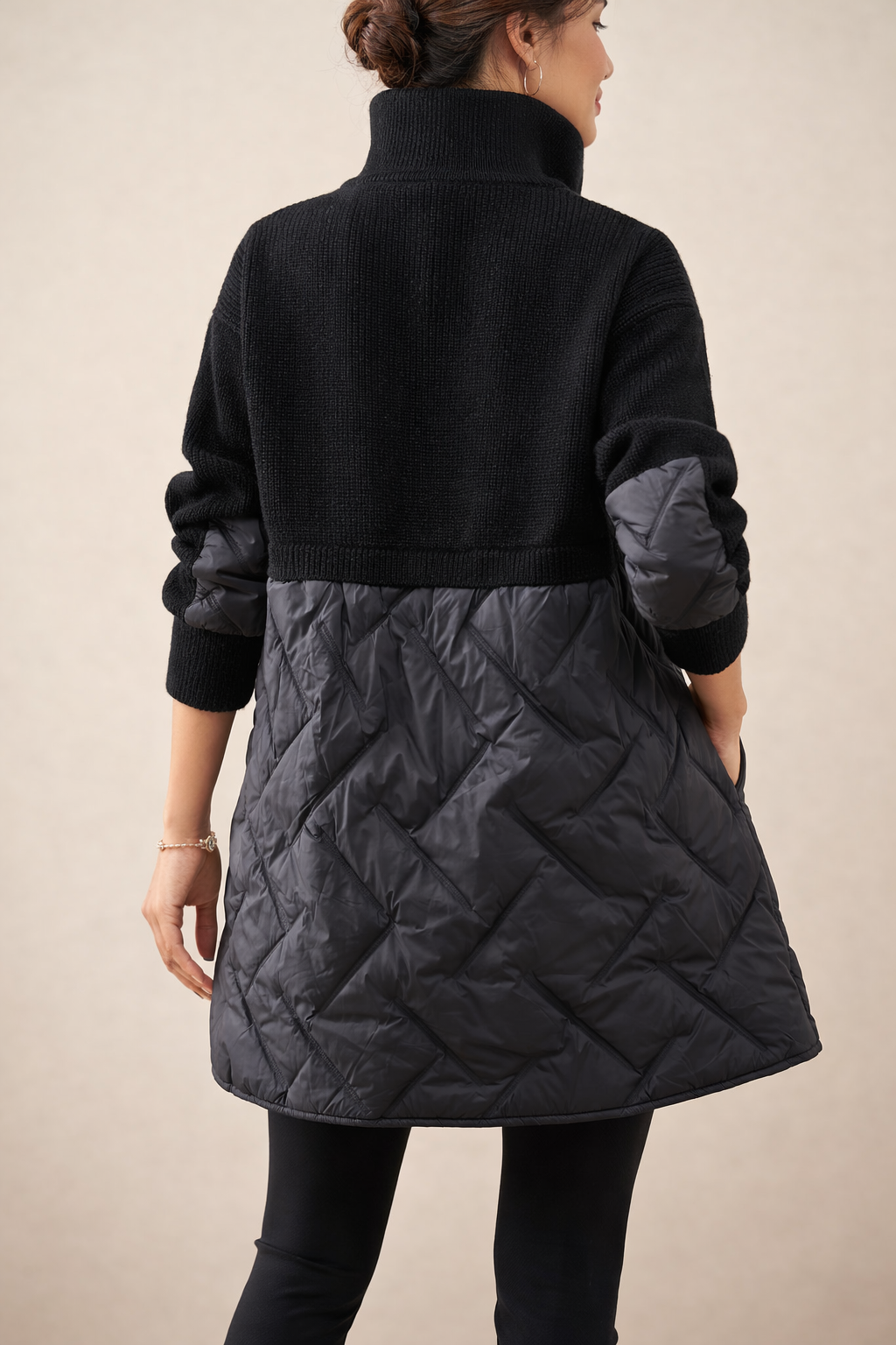 Long quilted puffer jacket for women from Christine Brewer, featuring a stylish design and quilted texture in a vibrant color.