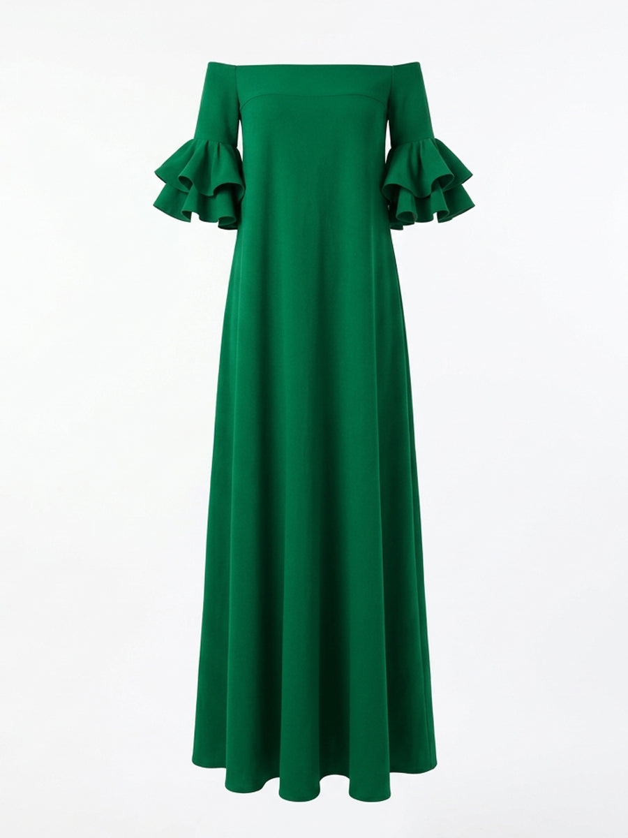 White Christine Brewer maxi dress with half sleeves, loose fit, solid color, off-the-shoulder design, perfect for casual or summer wear.