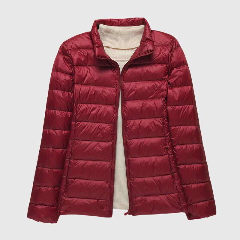 Christine Brewer Lily ultra-light quilted jacket in soft fabric, featuring a sleek design and subtle quilting pattern.