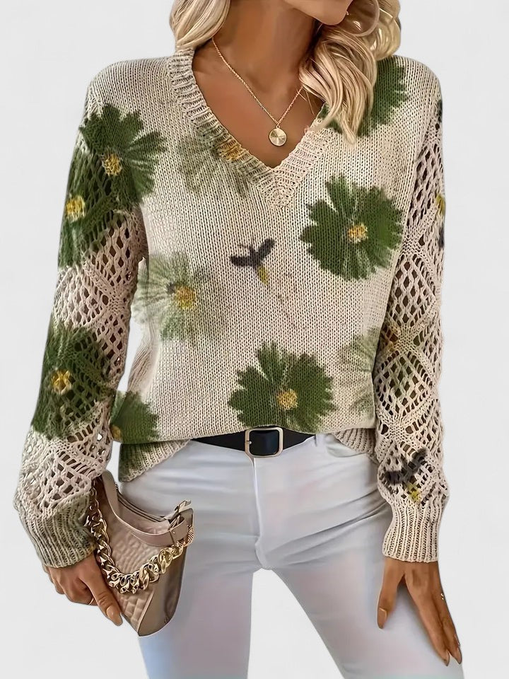 Whitney floral V-neck cardigan for women by Christine Brewer, featuring a colorful floral pattern and lightweight knit fabric.