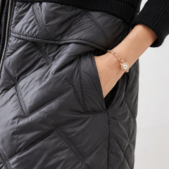 Christine Brewer Bella long quilted puffer jacket for women, showing the warm, insulated, quilted design in a stylish silhouette.