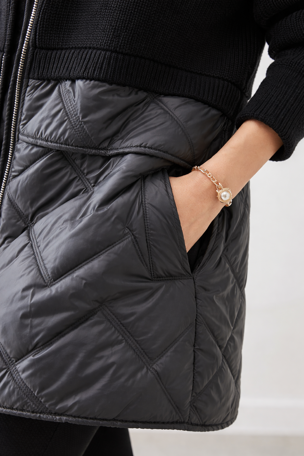 Christine Brewer Bella long quilted puffer jacket for women, showing the warm, insulated, quilted design in a stylish silhouette.