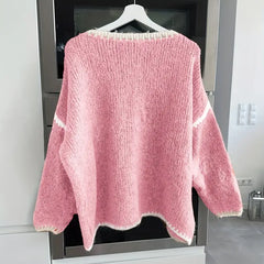 Women’s knit sweater by Christine Brewer featuring a cozy, stylish design, perfect for casual or layered winter outfits.
