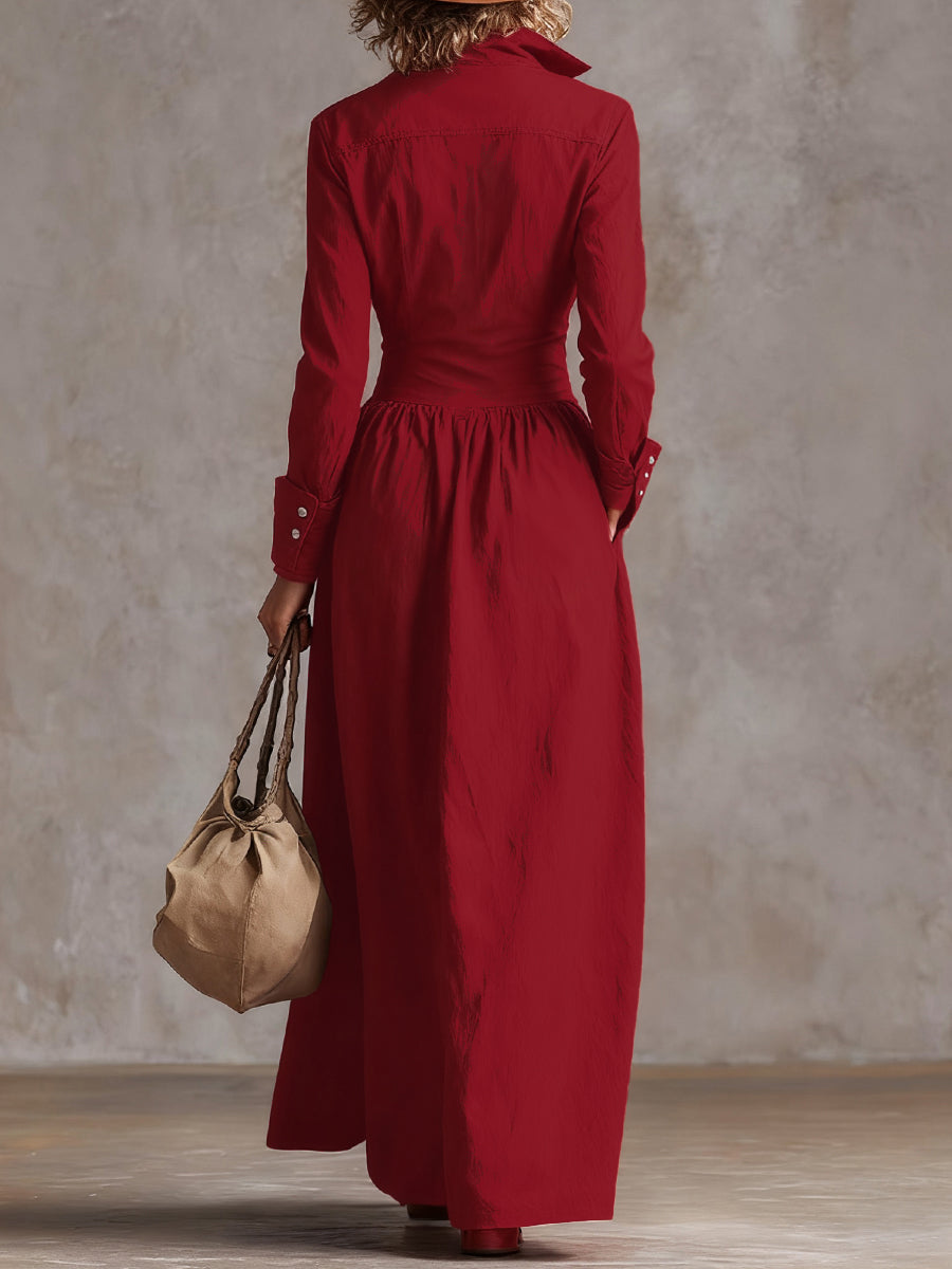 Christine Brewer high-waisted maxi dress with long sleeves, button details, pleated pockets, and a split-joint lapel in solid color.