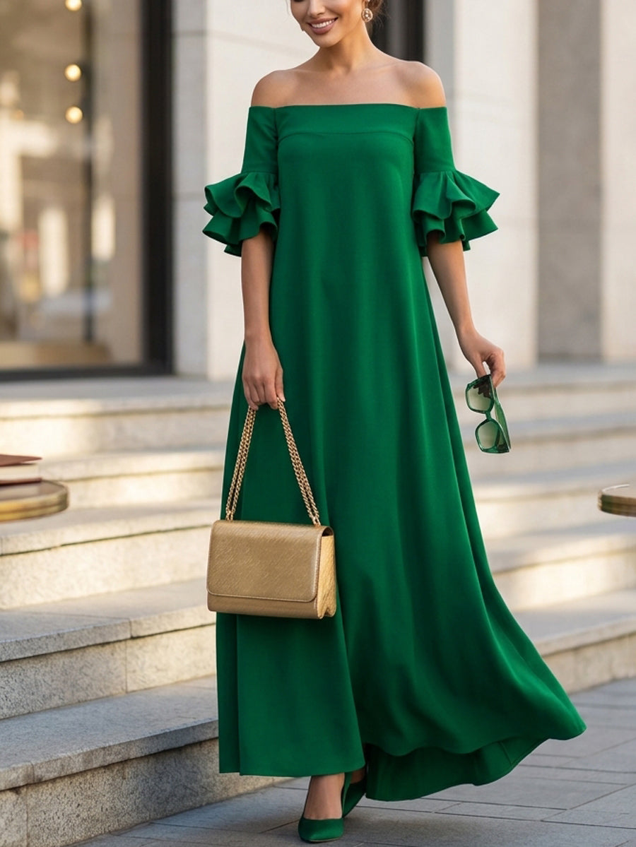 White Christine Brewer maxi dress with half sleeves, loose fit, solid color, off-the-shoulder design, perfect for casual wear.