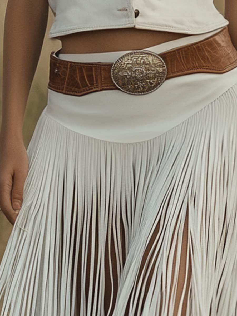 White suede tassel dress by Christine Brewer, casual dress with tassel details and relaxed fit, shown on a model.