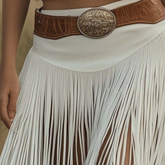 White suede tassel dress by Christine Brewer, casual dress with tassel details, styled for a relaxed, chic look.