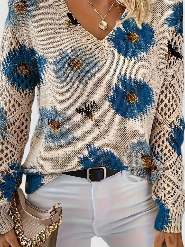 Whitney floral V-neck cardigan for women by Christine Brewer, featuring colorful floral patterns and a cozy knit design.