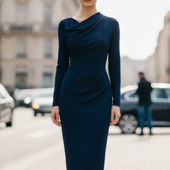 Navy draped long-sleeve midi dress by Christine Brewer, perfect for summer business occasions, shown on a model.