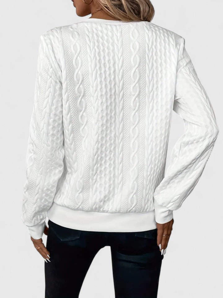 Women’s knit sweater named Natalie by Christine Brewer, featuring a cozy, textured knit pattern in a stylish design.