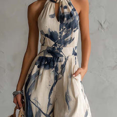 White ink wash print halter neck wide-leg women's jumpsuit with pockets by Christine Brewer, featuring a stylish, relaxed fit and comfortable design.