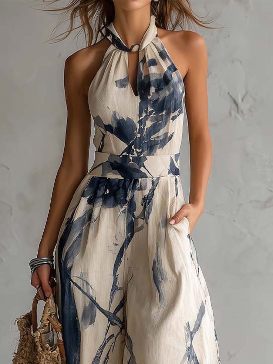 White ink wash print halter neck wide-leg women's jumpsuit with pockets by Christine Brewer, featuring a stylish, relaxed fit and comfortable design.