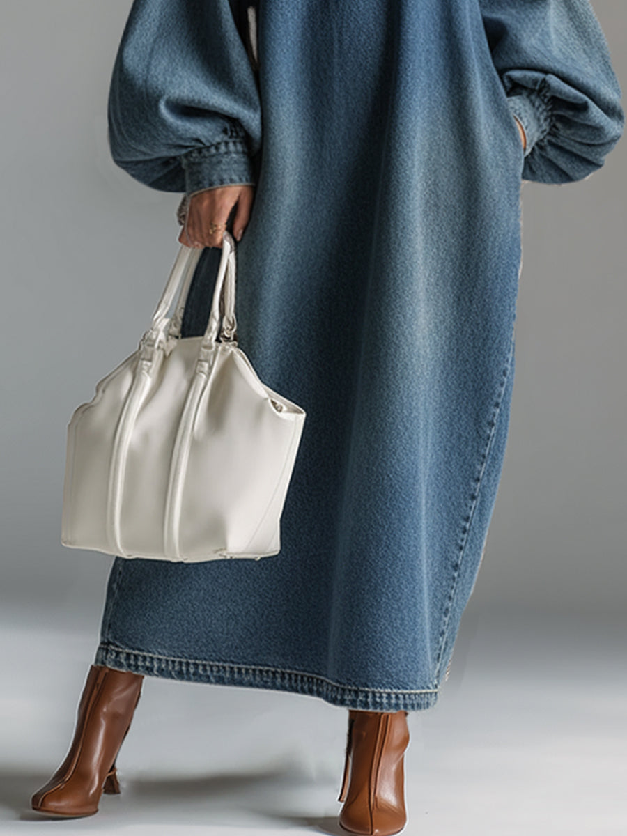 Blue denim maxi dress by Christine Brewer featuring a flowing silhouette, perfect for elegant evening occasions.