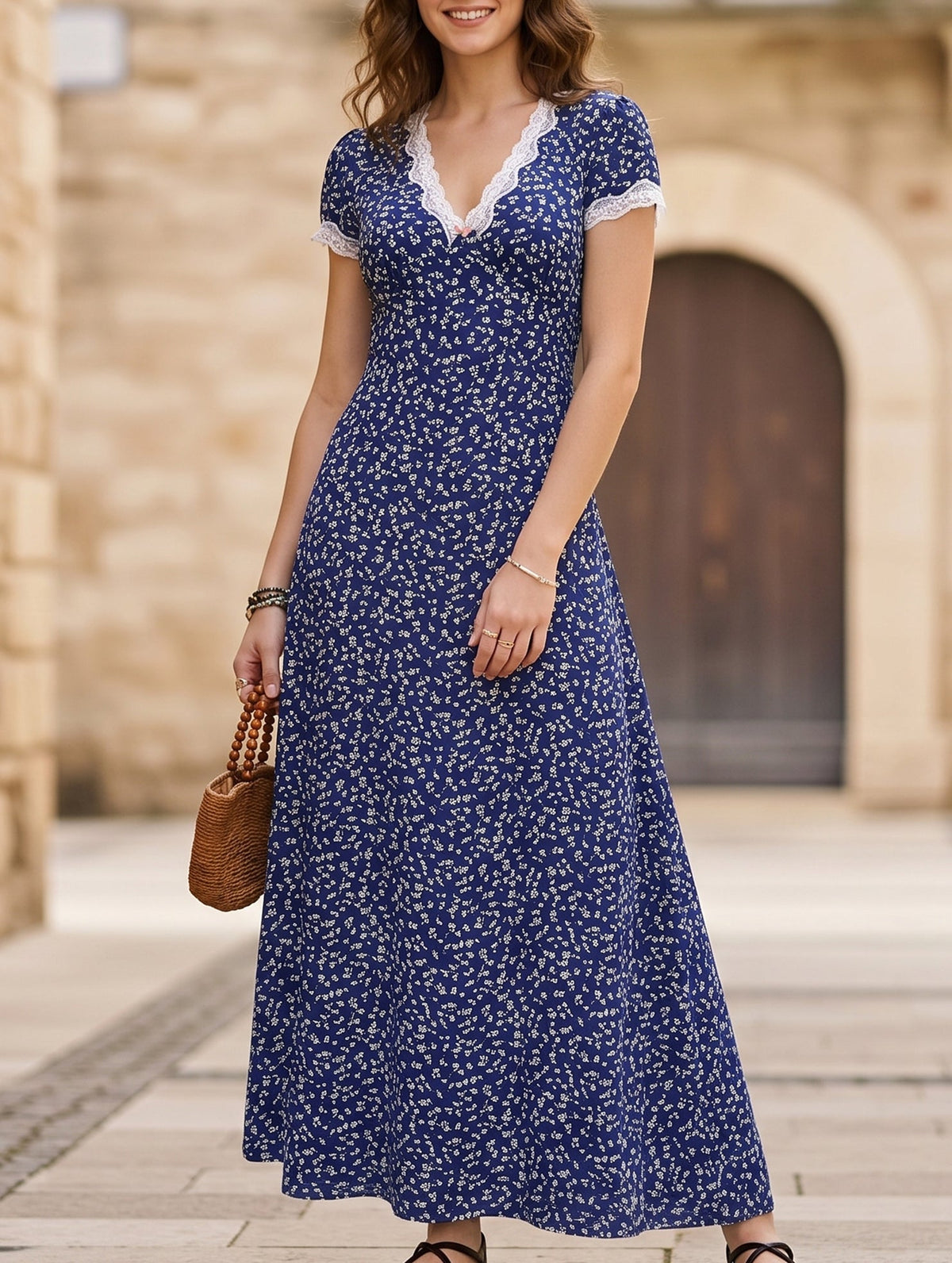 White lace patch floral V-neck maxi dress by Christine Brewer, featuring intricate lace details and a flowing silhouette.