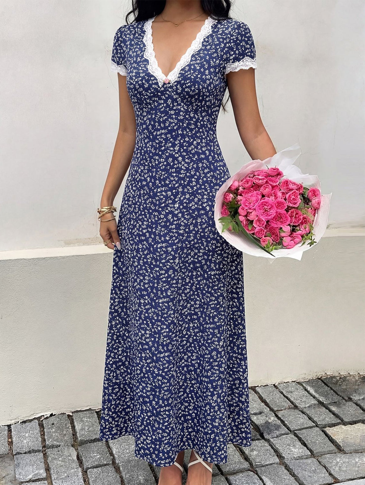 White lace patch floral V neck maxi dress by Christine Brewer, featuring intricate lace details and a flowing silhouette.