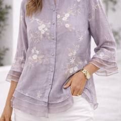 Floral green blouse for women from Christine Brewer's Zoe collection, featuring lightweight fabric and a feminine floral print.