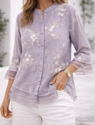 Floral green blouse for women from Christine Brewer's Zoe collection, featuring lightweight fabric and a feminine floral print.