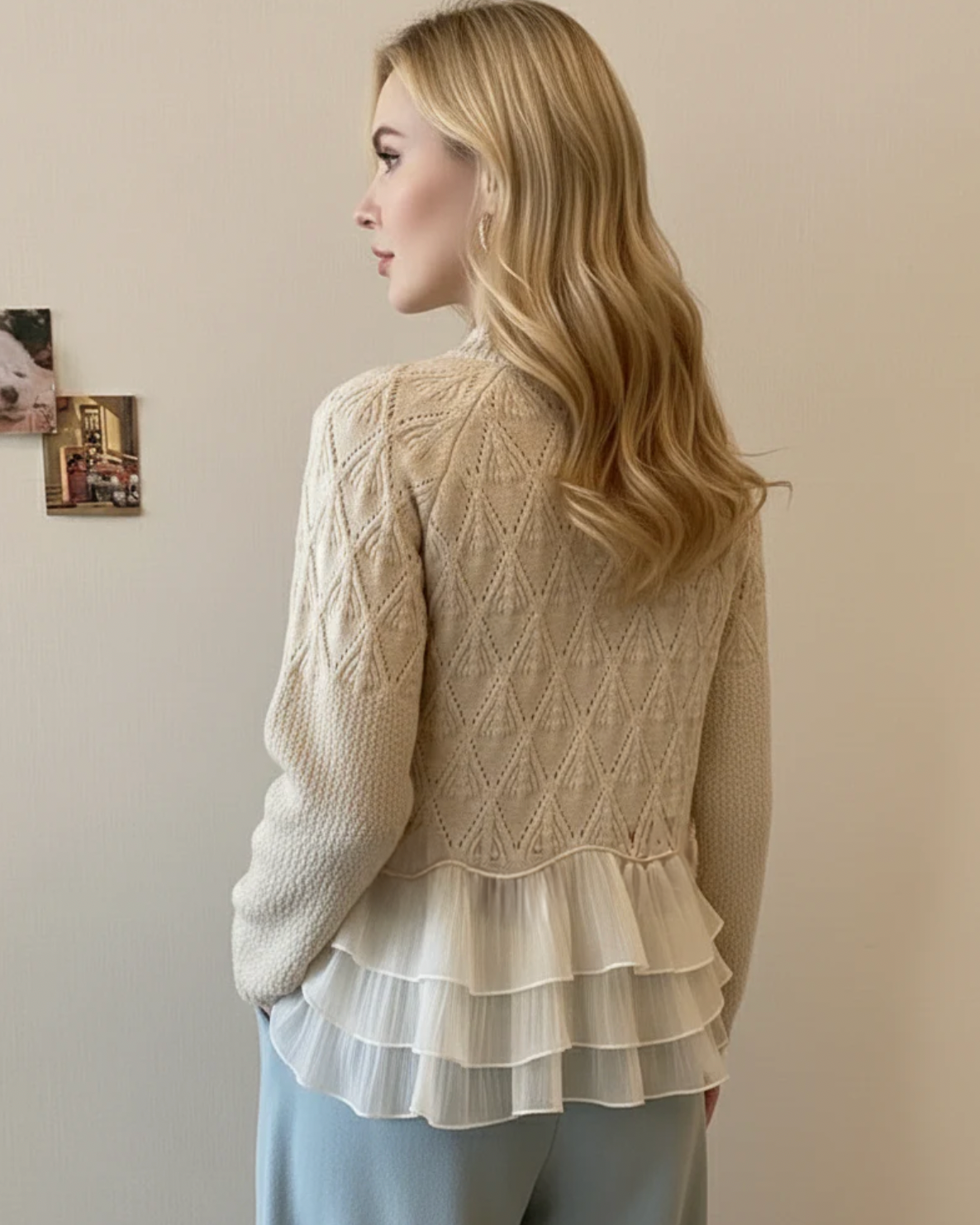 Back view of Christine Brewer Zoe cozy warm relaxed fit cable knit sweater, showing its chunky knit texture and relaxed silhouette.