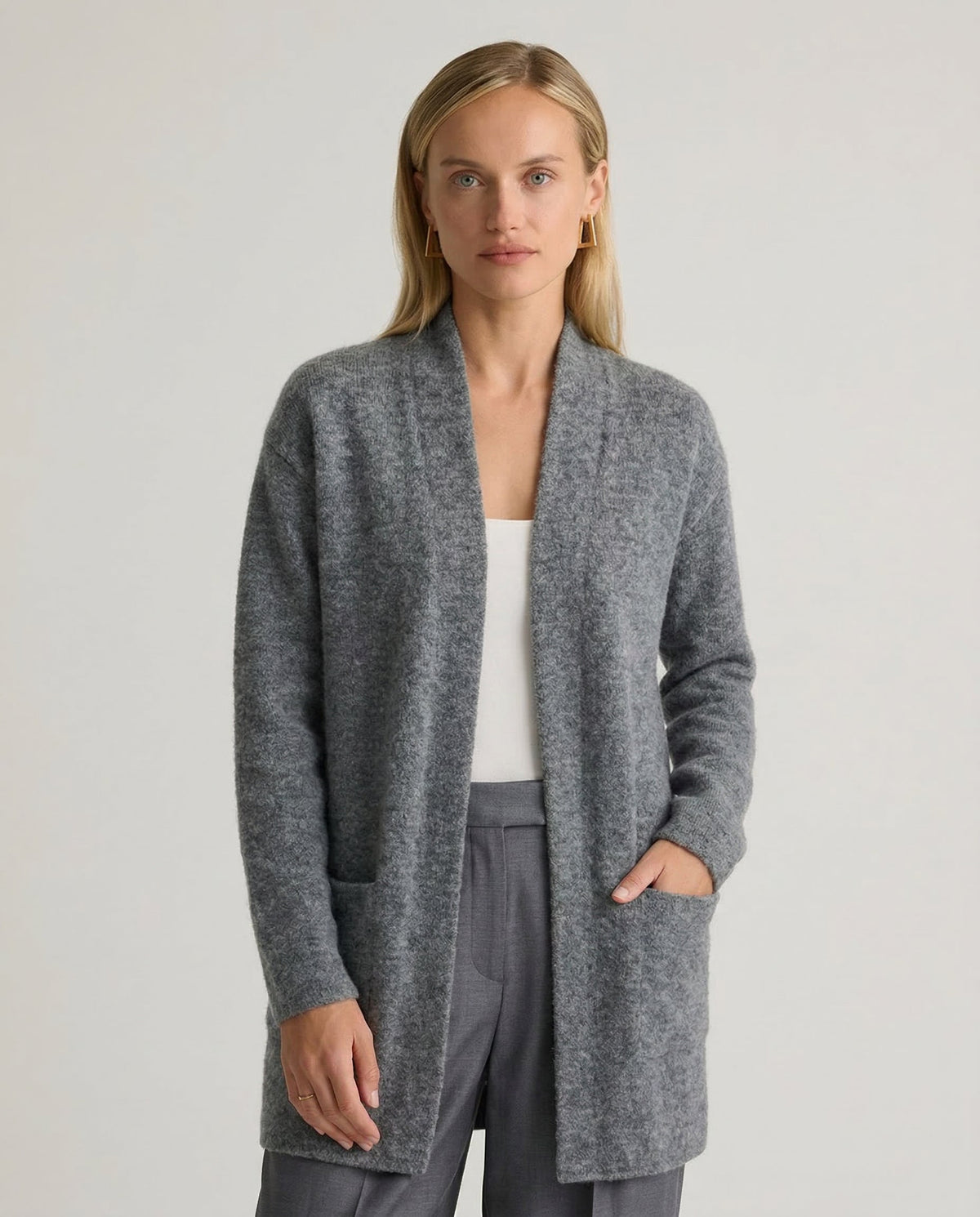 Women’s Jacqueline Merino Wool Cardigan by Christine Brewer, featuring a cozy, beige knit design perfect for casual wear.