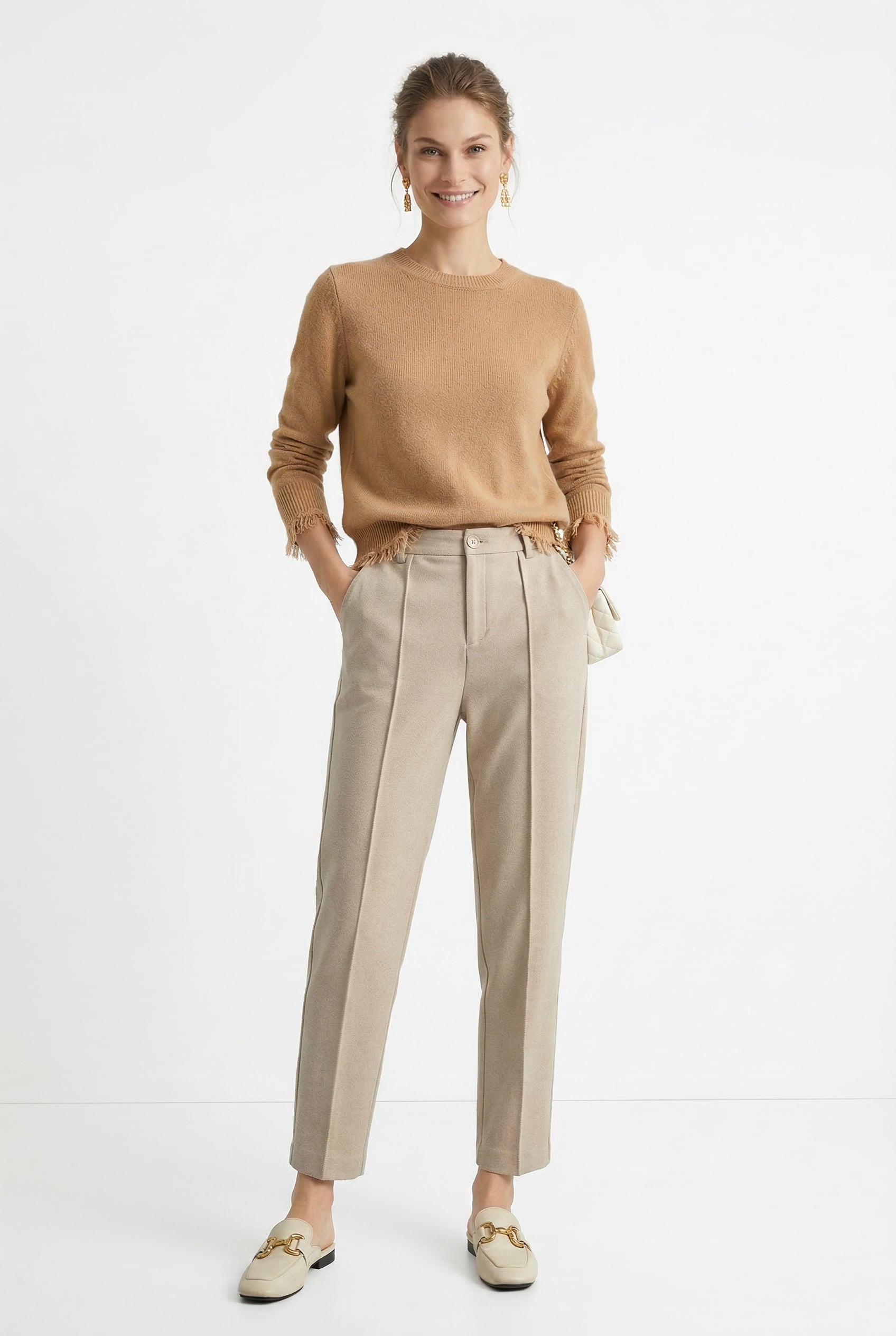 Women's wool tapered trousers by Christine Brewer, featuring a classic fit and smooth merino wool fabric.